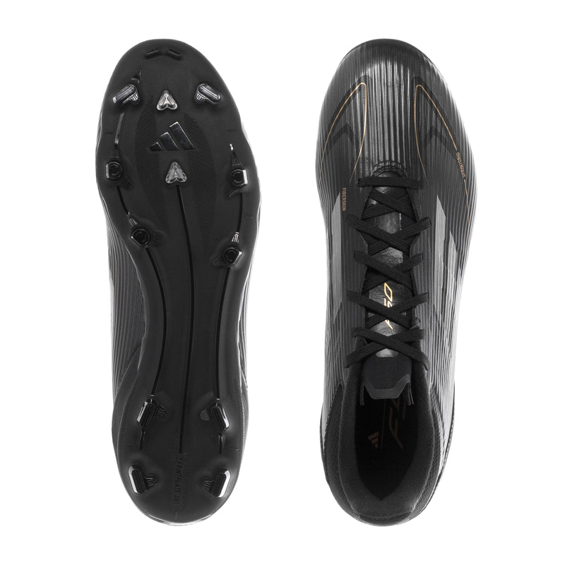 Men's soccer cleats, outsole view showing black molded studs