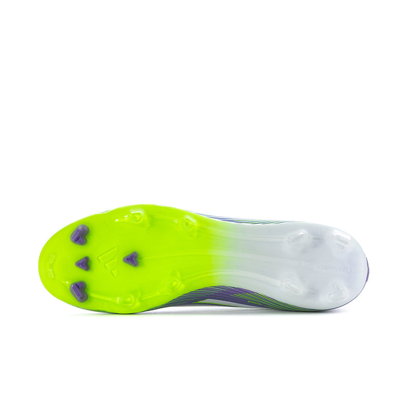 Outsole view of men's soccer cleats with lime-green plate and clear stud studs