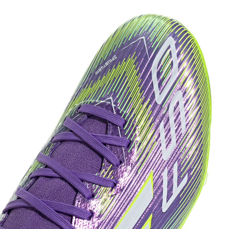 Men's mid-cut soccer cleat upper with purple laces and neon green graphic stripes