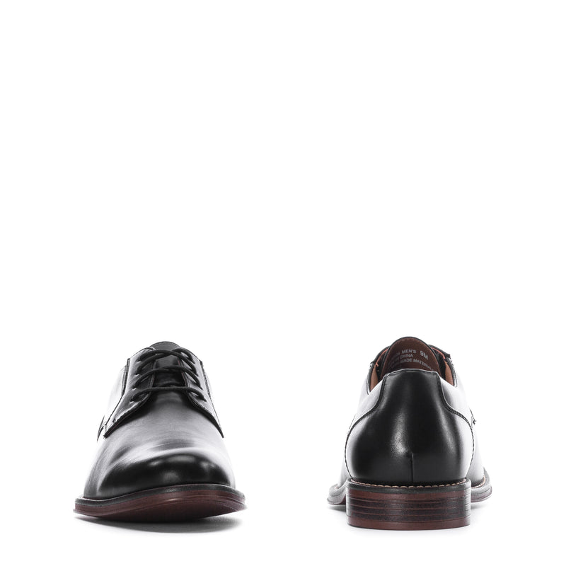 Men's black lace-up dress shoes, front and back views, brown sole