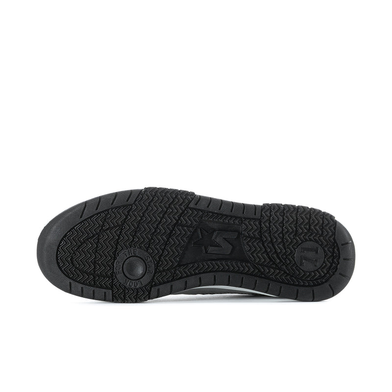 Men's low-top sneaker outsole with textured tread and circular logo detail