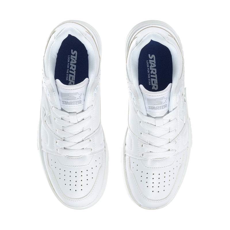 Women's white low-top sneakers, front view showing laces and padded tongue lining