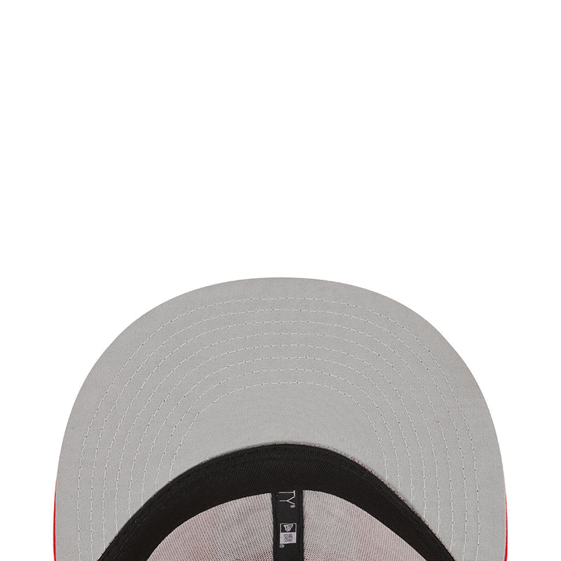 Youth gray trucker cap with black inner brim and stitched paneling