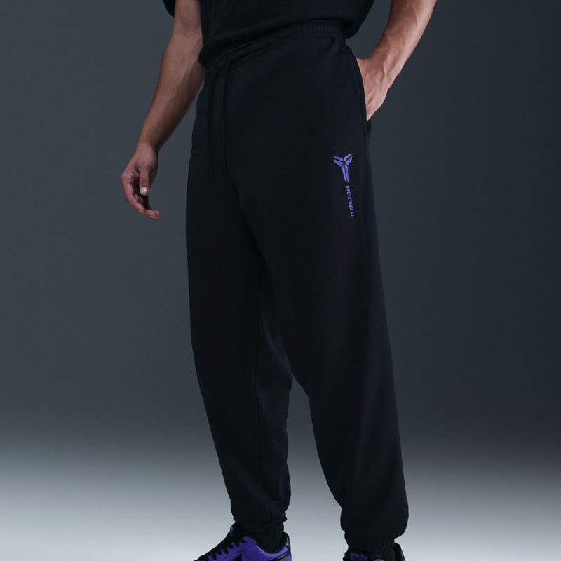 Black track pants with drawstring waist, side logo and relaxed straight leg