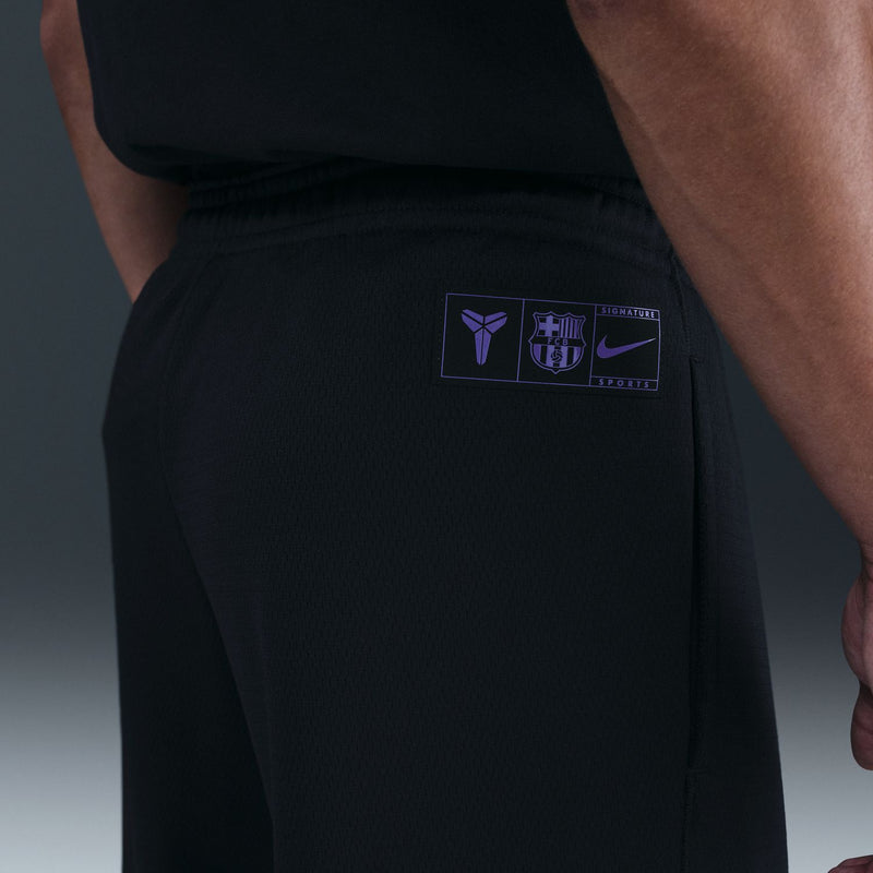 Black track pants with woven logo label on side hip in purple and white