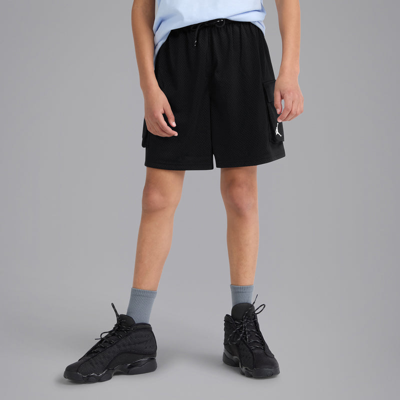 Youth black cargo shorts with cargo pocket flap and Jumpman logo on side