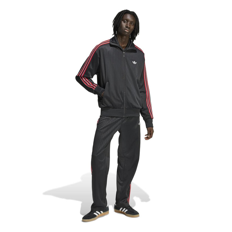 Men's black track jacket with red-and-white sleeve stripes, stand collar and full zip