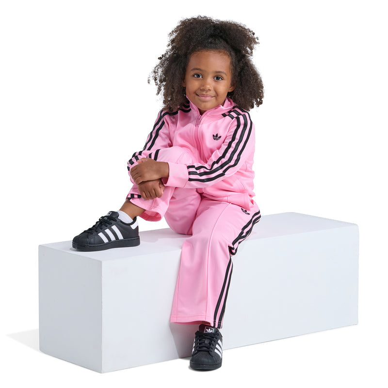 Kids' light pink track jacket and wide-leg pants with black stripes and trefoil logo