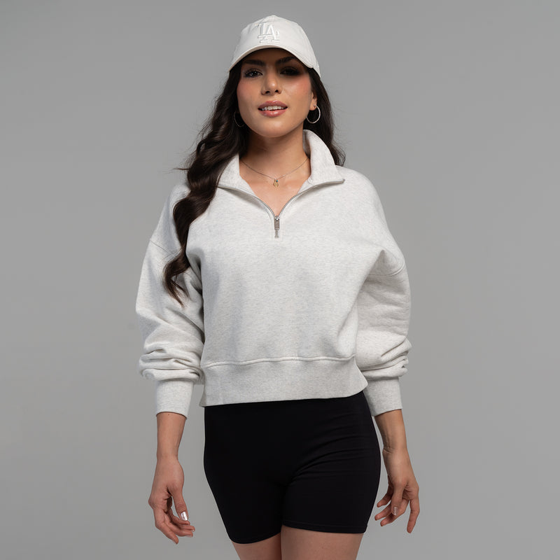 Women's ash heather fleece quarter-zip pullover with black shorts