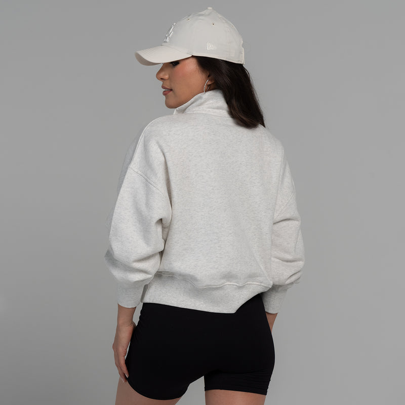Women's ash heather fleece quarter-zip pullover, side view on model