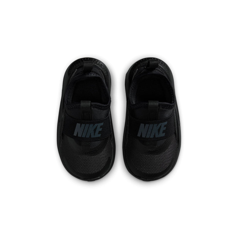 Toddler black slip-on sneakers with NIKE logo on the tongue and cushioned collar