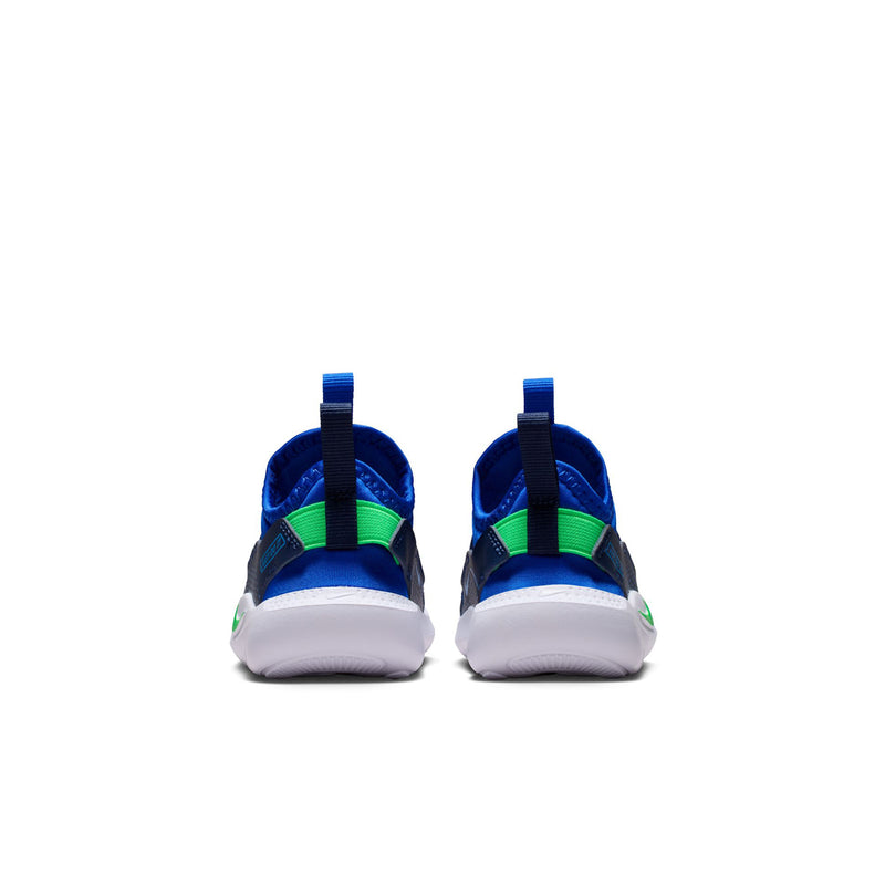 Toddler blue sneakers with green trim, dark heel pull, white cushioning
