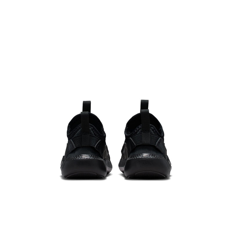 Toddler black slip-on sneakers, back view with heel pull tab and rubber sole