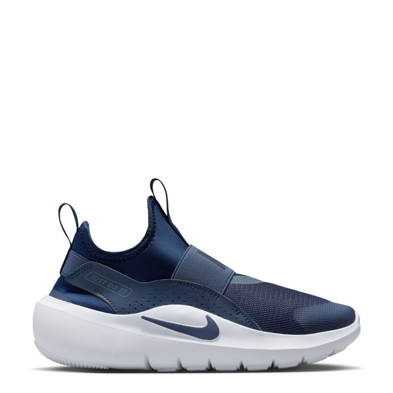 Youth navy slip-on running shoe with strap, white sole and Nike swoosh.