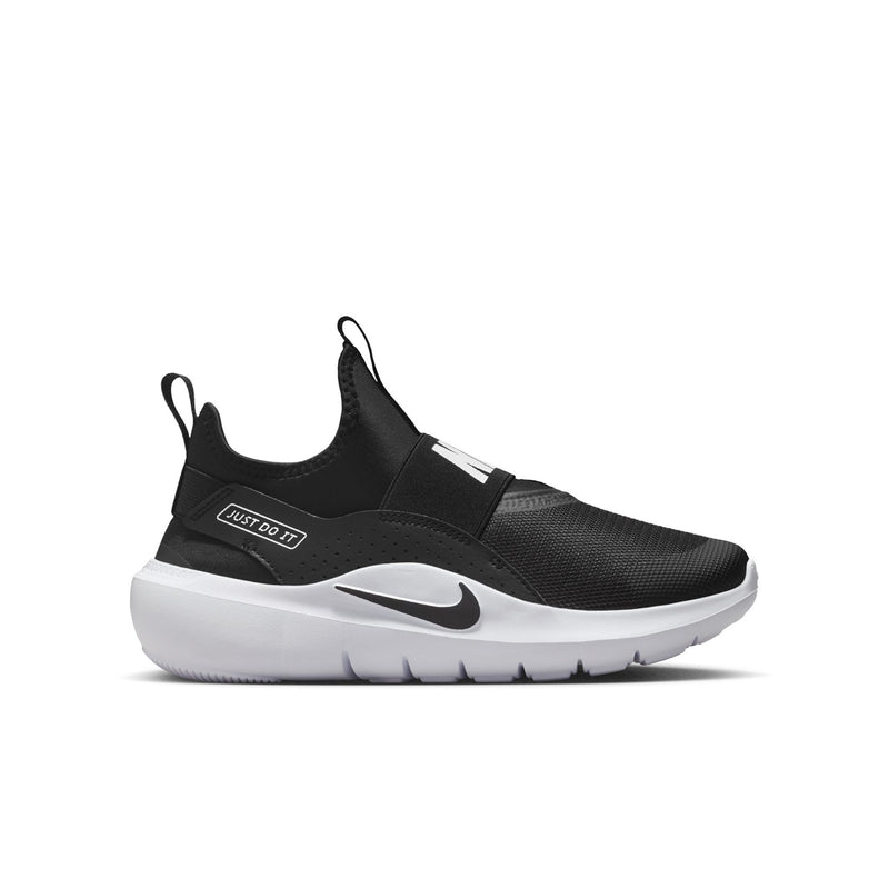 Youth black slip-on running shoe with white midsole and Nike swoosh