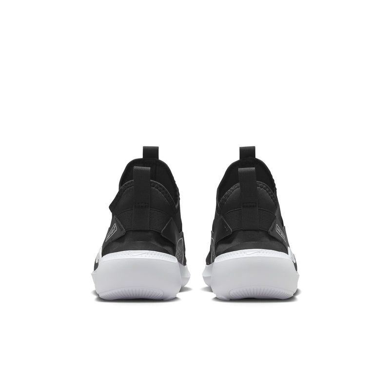 Youth black slip-on running shoe, heel view with white sole and strap