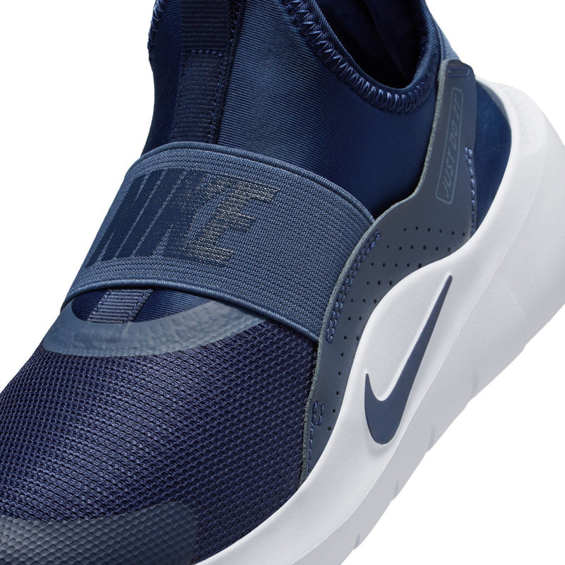 Youth navy knit upper with strap and white midsole edge, Nike swoosh detail.