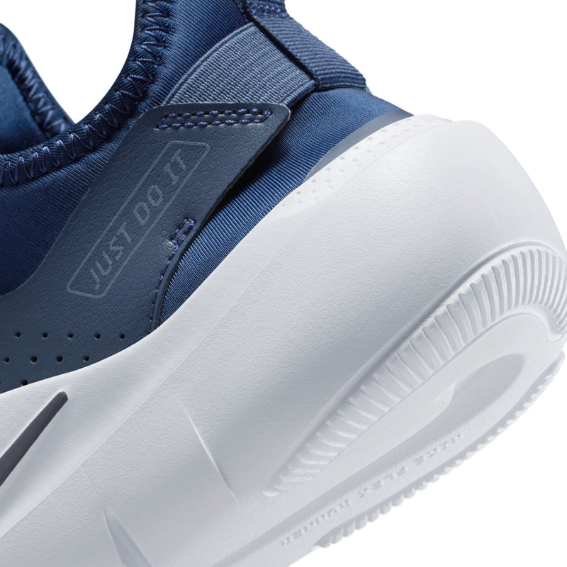Youth navy shoe close-up of knit upper and white midsole, Nike swoosh detail.