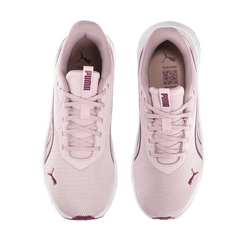 Light pink women's lace-up sneakers with padded tongue, visible PUMA logo on toe sides