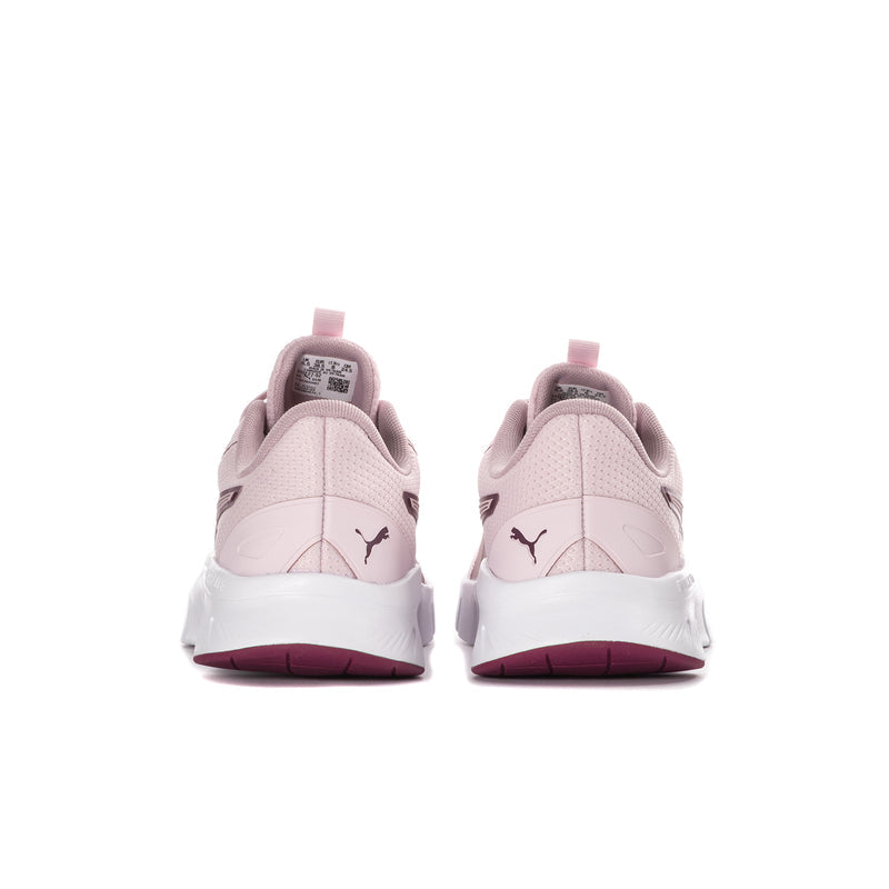 Light pink women's sneakers with cushioned collar and heel, white midsole with maroon edge