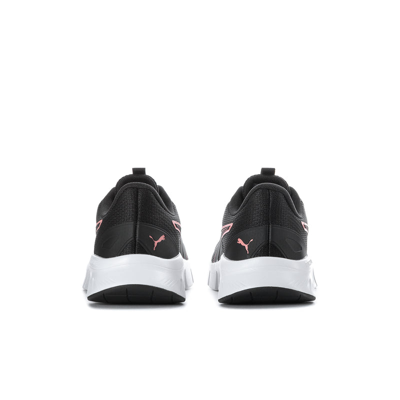 Back view of black women's running shoes with white sole and PUMA logo
