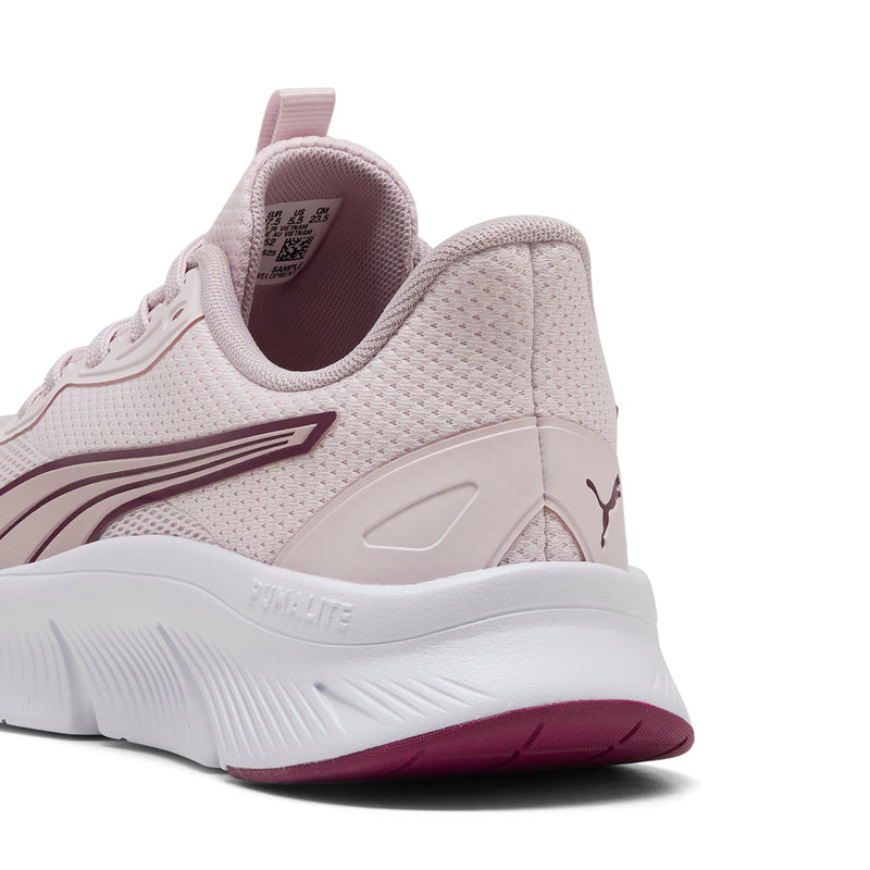 Light pink women's sneakers heel and side panel with cushioned midsole and maroon trim