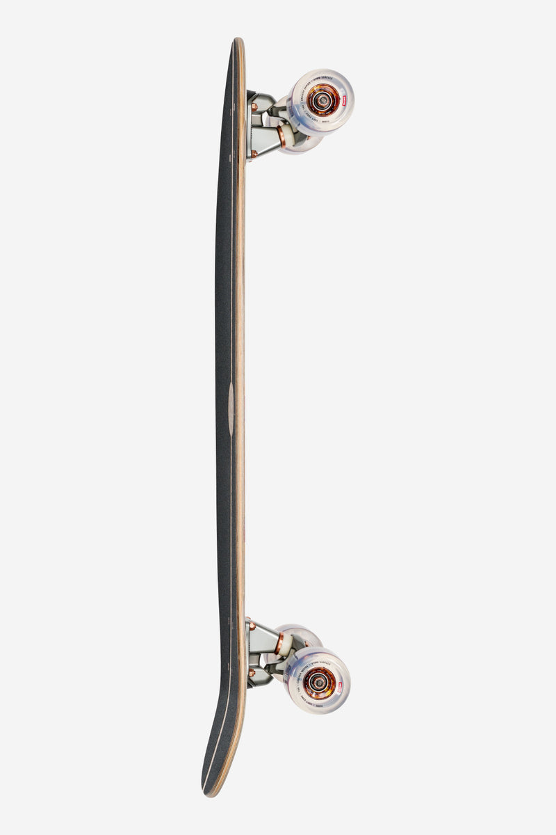 Side view of Forager Cruiserboard 34 Mesa with dark deck and wood inlay, magnesium trucks and clear wheels