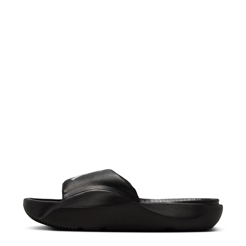 Black youth slide sandal, front three-quarter view with contoured footbed.