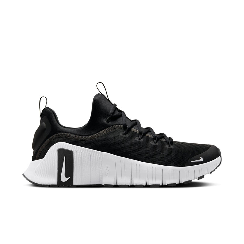 Men's black athletic sneakers with white midsole and molded side panel