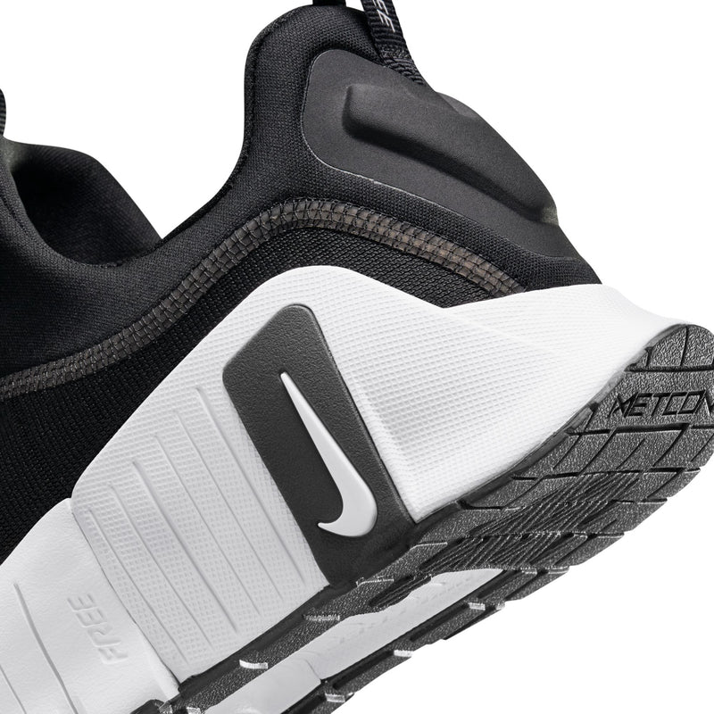 Close-up of men's black-and-white sneaker heel and side logo detail