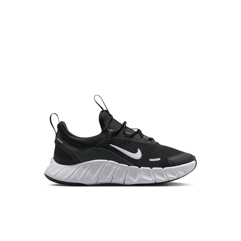 Kids' black and white sneakers with cushioned sole and Nike Swoosh