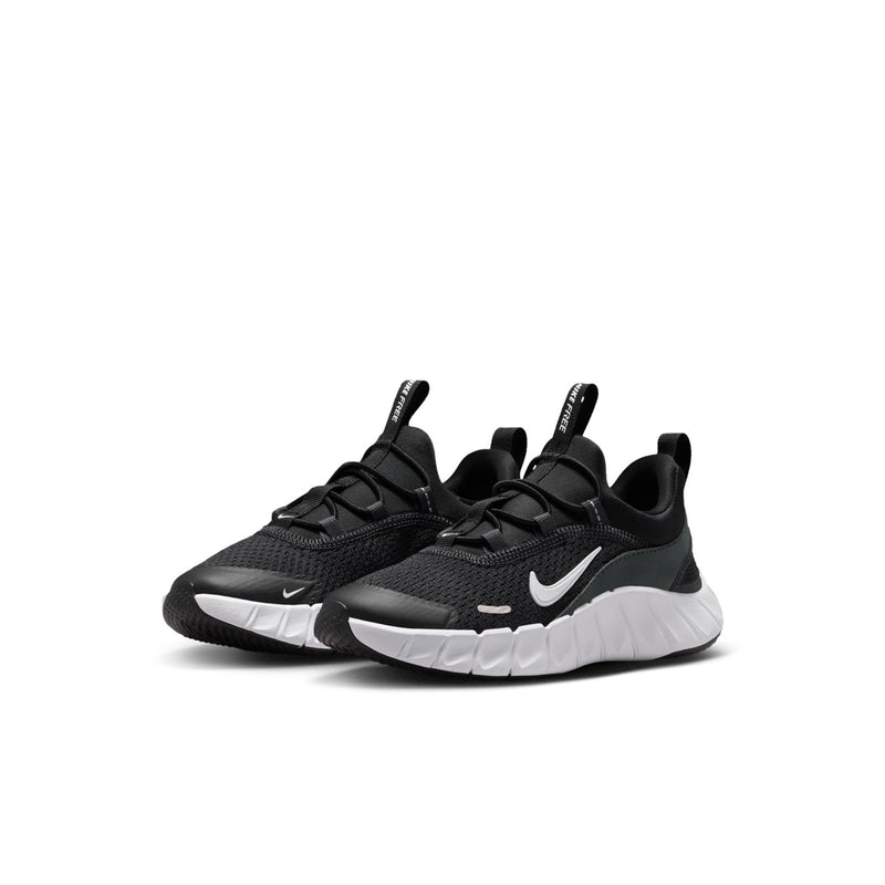 Kids' black sneakers with white sole, lace-up design, and side Swoosh