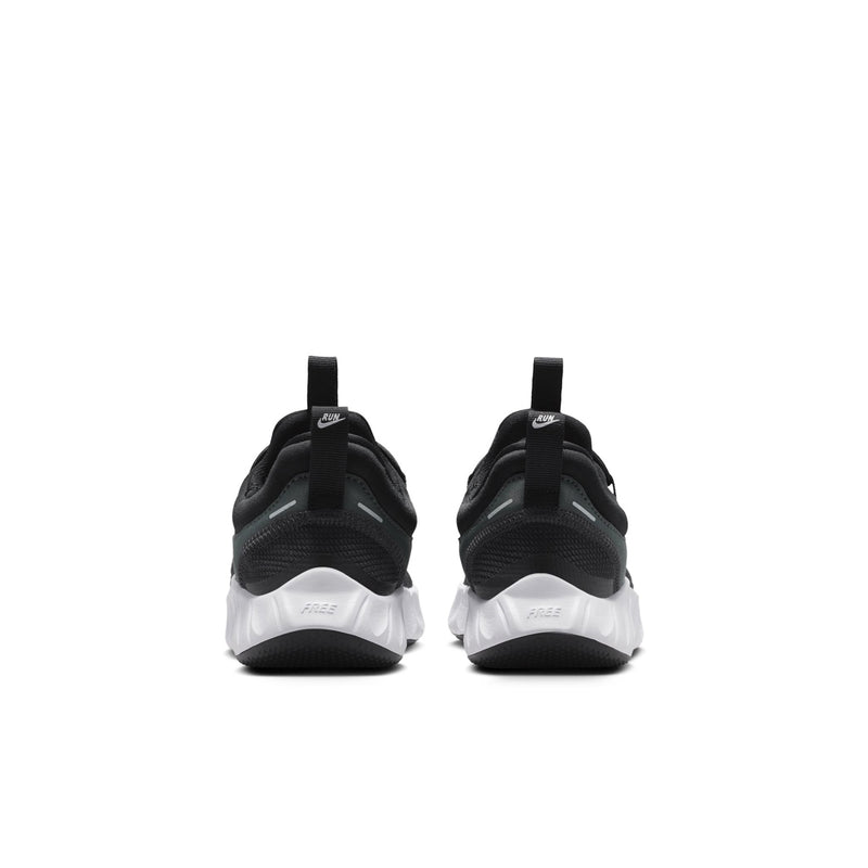 Kids' black sneakers from the back with white midsole and pull tabs