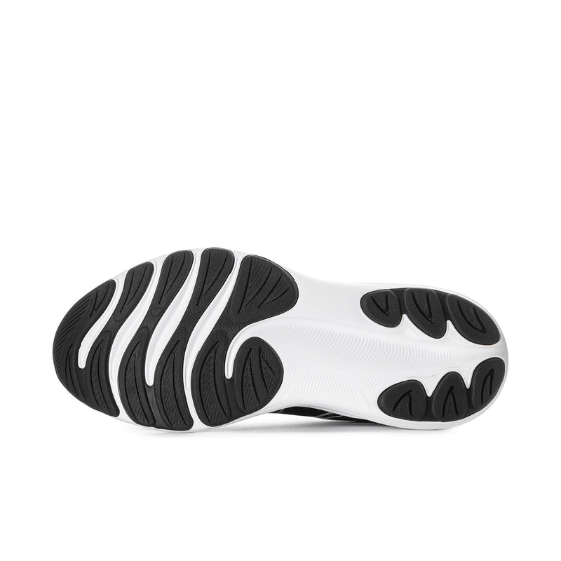 Men's black and white running shoe outsole with patterned tread and cushioned heel