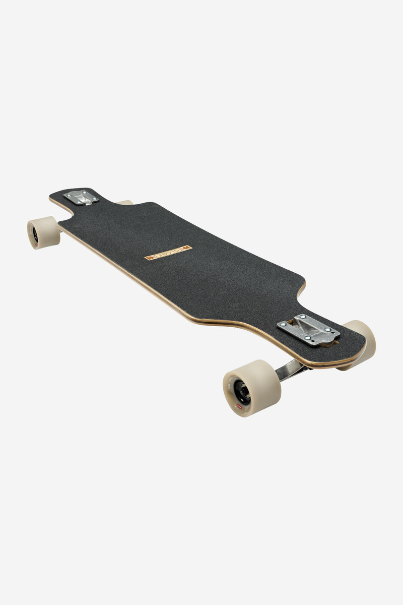 Geminon 37.5 longboard 38 inch Arid top view showing dark grip tape and a gold center logo