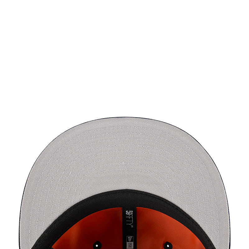 Light gray baseball cap close-up with black inner crown and eyelets
