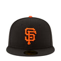 Black baseball cap with orange SF-style logo on front and orange top button