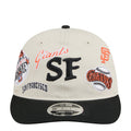 Two-tone baseball cap with cream crown, black brim, Giants logo front