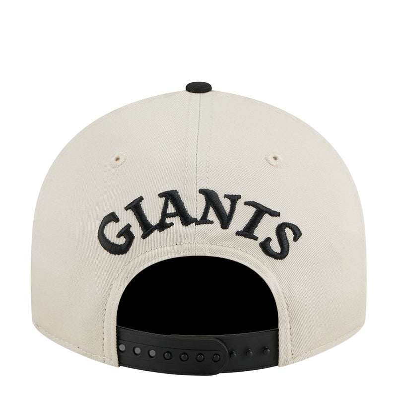 Two-tone baseball cap with cream back, large Giants lettering, black snapback