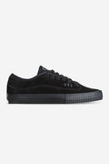 Gillette black suede sneakers with matching black sole, side profile.