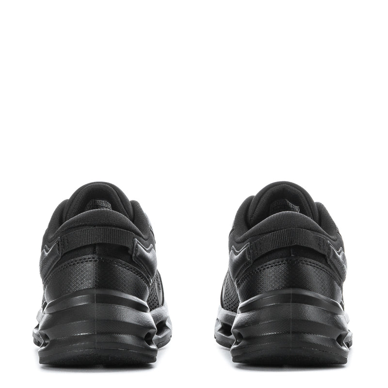 Black kids sneakers heel view, lace-up padded collar and chunky sole