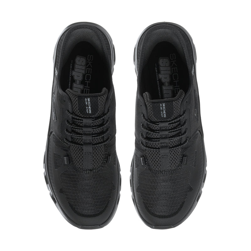 Men's black sneaker front view showing laces, tongue, and eyelets