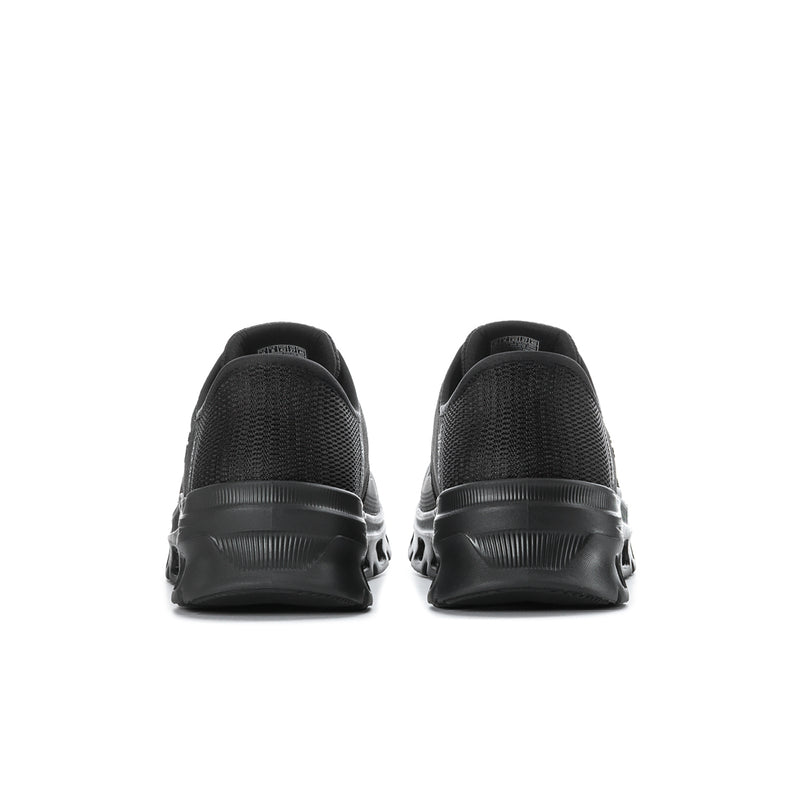 Men's black sneaker heel view with cushioned collar and back tab
