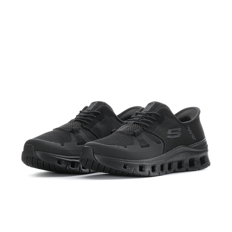 Men's black slip-resistant sneakers, angled side view, chunky tread sole