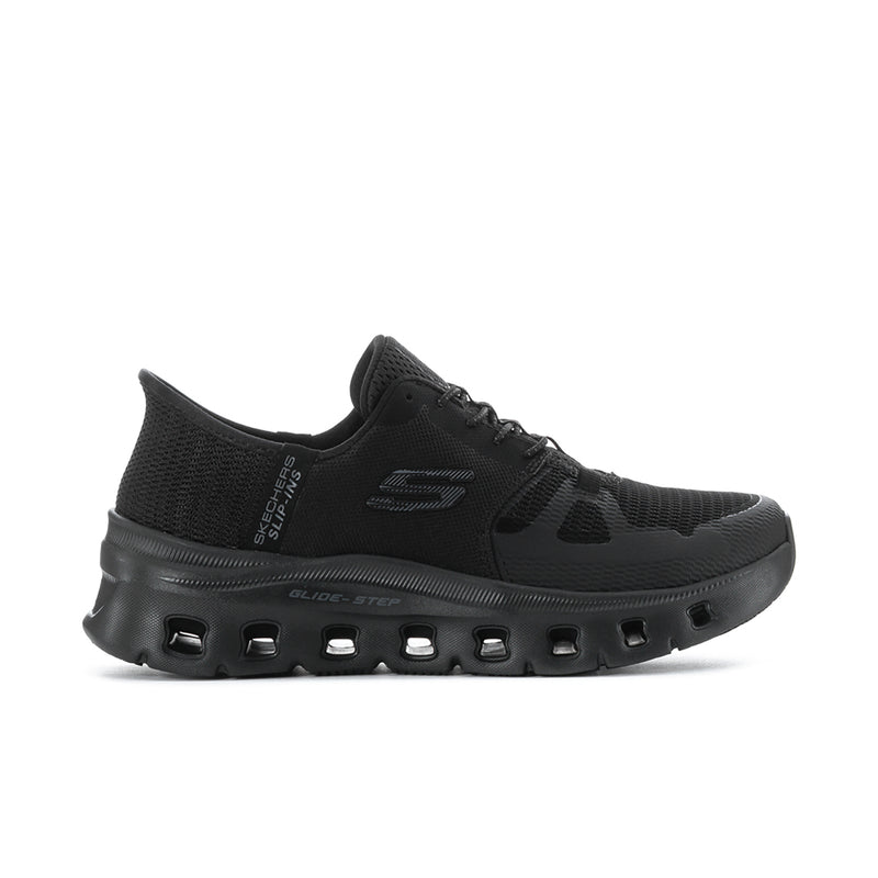Black women's slip-resistant sneaker with cushioned, textured rubber outsole