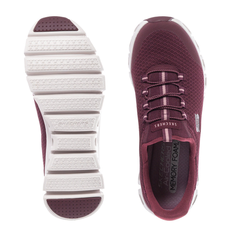 Burgundy lace-up shoe viewed from side and sole; white tread outsole