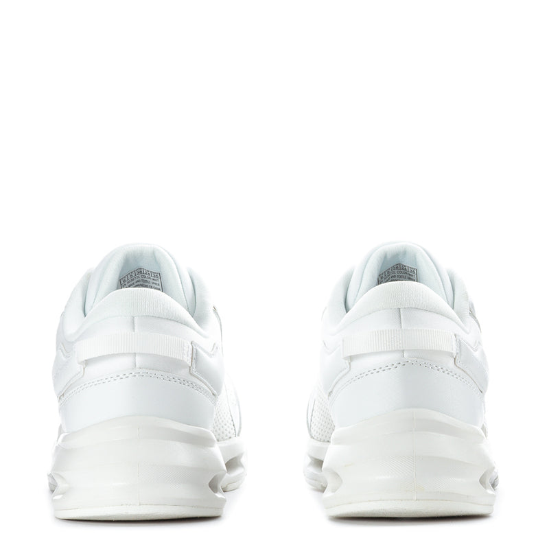 White youth lace-up sneakers shown from the back with padded heel collar and rubber sole