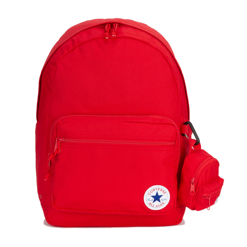 University Red backpack with front zip pocket, top handle, and side bottle pocket.