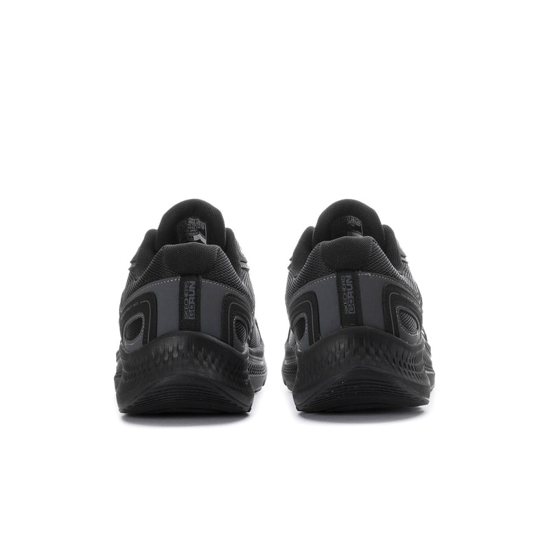 Black running shoe heel view with molded midsole and rear support panel