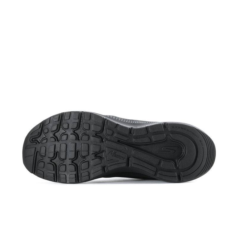 Black rubber outsole with deep tread pattern for traction